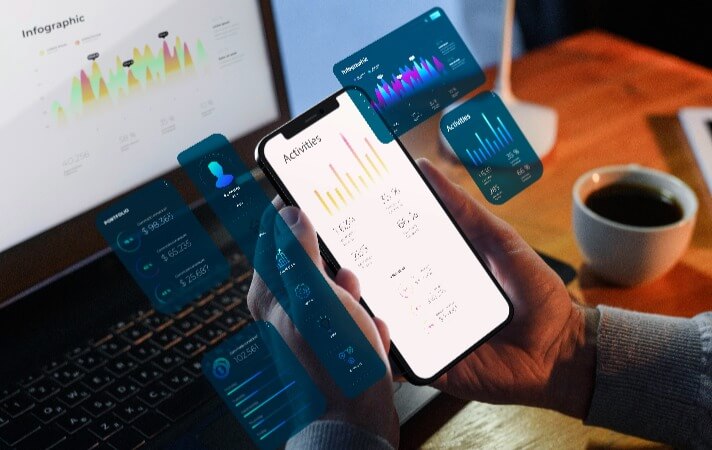 Person holding smartphone showing digital investment portfolio information. 