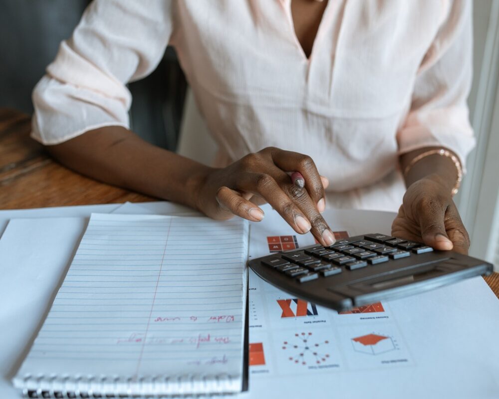 women calculating property bills