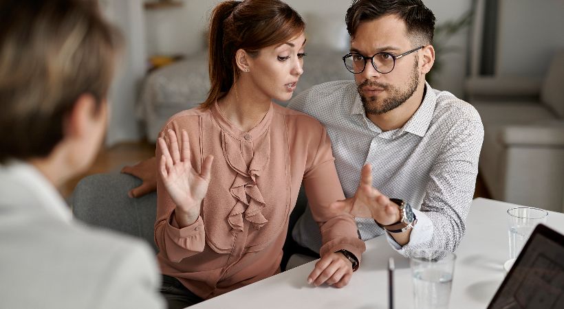 Partners meeting with their solicitor